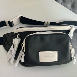 Coach men’s track belt bag in signature canvas. Gunmetal/charcoal chalk.